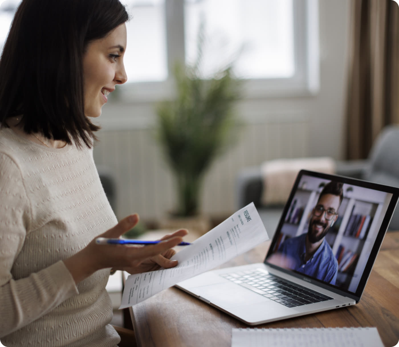 Employer on a video call reviewing candidate evidence